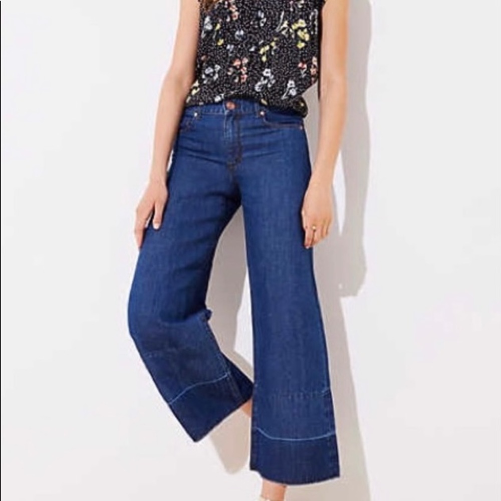 Loft medium/dark wash wide lead crop jeans.